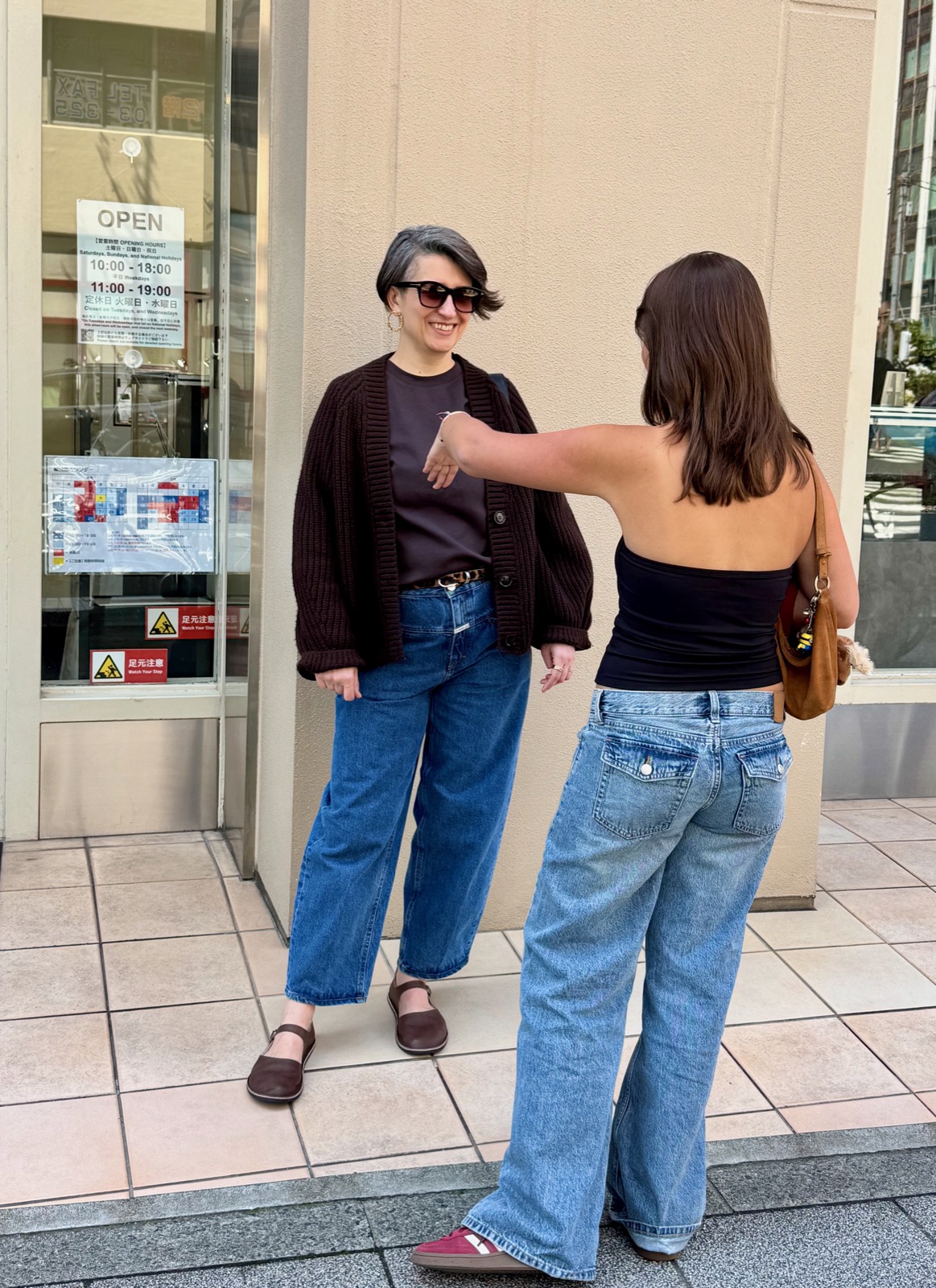 Natalia and Seraphima outside a shop in Akihabara