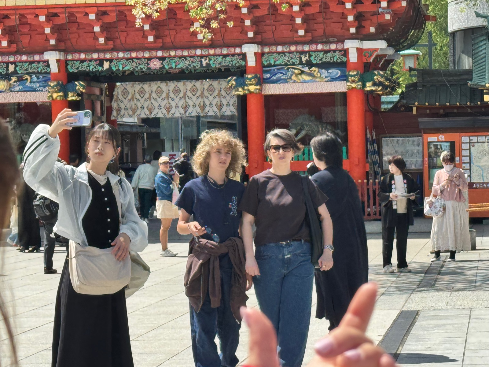 Luca and Natalia at Kanda Myojin shrine with the vermilion main hall