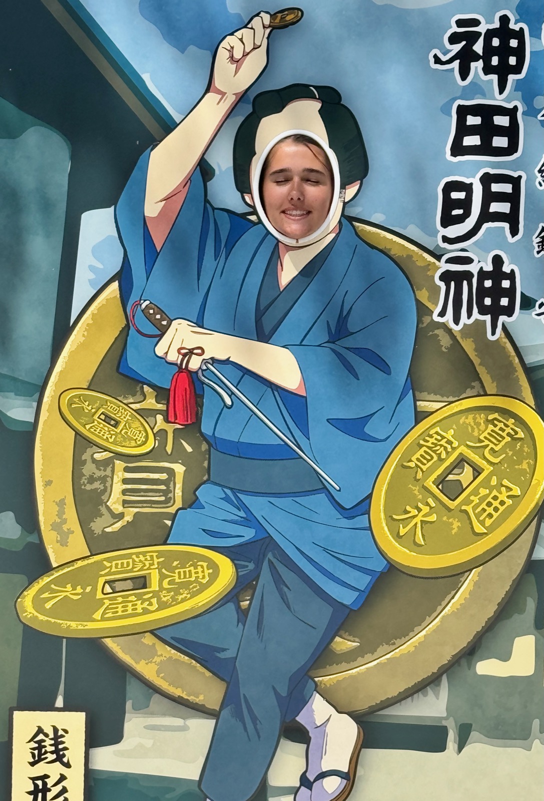 Luca in the Kanda Myojin samurai face-in-hole photo board