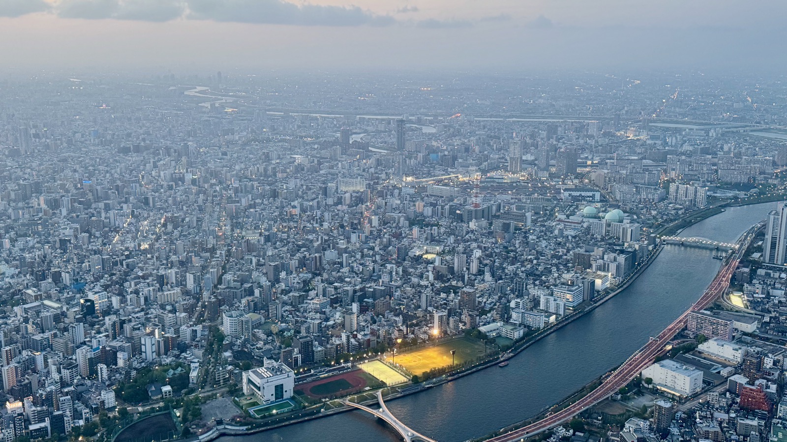 Panoramic view from Tokyo Skytree at blue hour — Sumida River and Tokyo sprawl