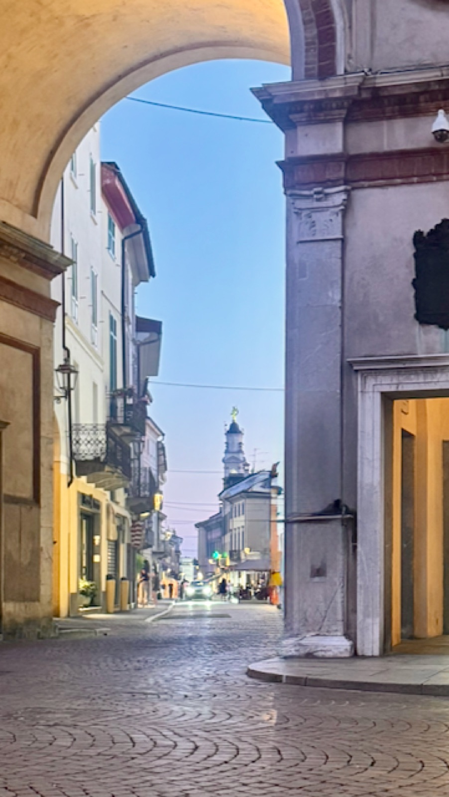Through the arches off Piazza del Duomo at dusk, Crema